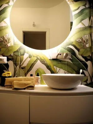 a bathroom counter with a sink and a mirror at DomusLatina Monti - Luxury stay in the heart of Rome in Rome