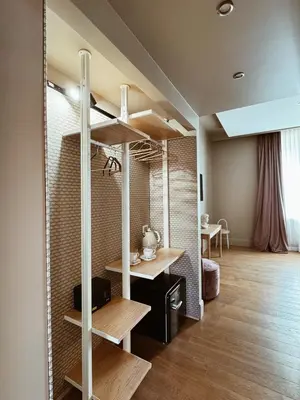 a room with a loft bed with a desk at Residenza Imperiale - Luxury Guest House in Rome