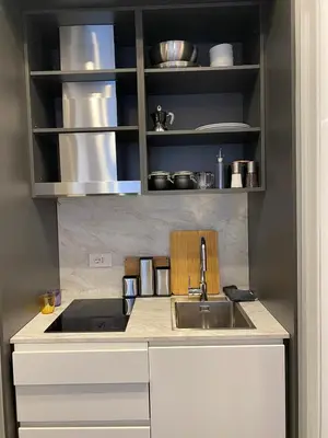 a kitchen with a sink and a counter at Suite dolce vita - san pietro in Rome