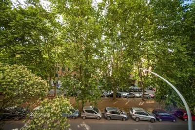 a group of cars parked in a parking lot at Great Apartment in great Location in Rome