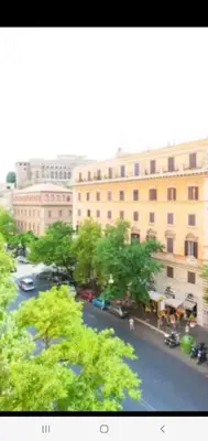 a view of a city street with a large building at Cuore Di Roma Holidays in Rome