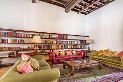 a living room with two couches and a coffee table at iFlat Pantheon Elegant 3-bedroom Apartment in Rome