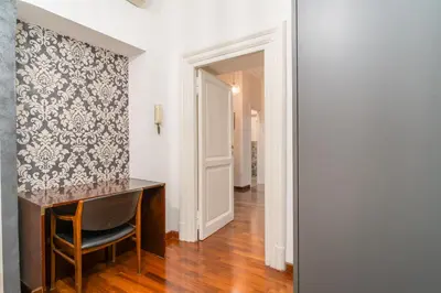 a home office with a chair and a desk at OLEUM Roma Veneto in Rome