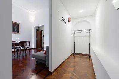 a living room with a couch and a table at Rome Historic Center Stylehouse in Rome