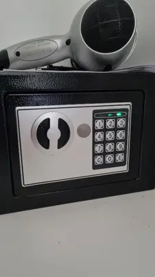 a close up of a radio with aopter at BAM BAM TIBURTINA Guesthouse in Rome