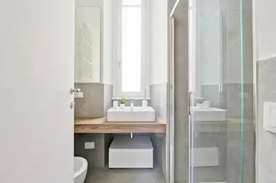 a bathroom with a sink and a toilet at Nizza 33 in Rome