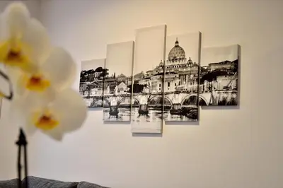 a picture of a building on a wall at Apartment Veio in Rome