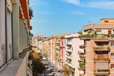 a view of a city street with buildings at Adelante Rooms San Giovanni in Rome