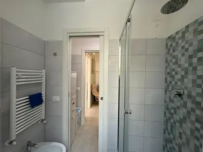 a bathroom with a shower and a toilet at Quiet Corner in the Eternal City in Rome
