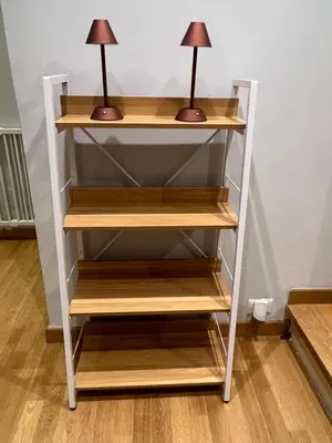 a shelf with two lamps on top of it at Savoia design apartment with terrace - Rome center in Rome