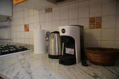 a coffee maker on a counter in a kitchen at Casa del Drago in Trastevere in Rome