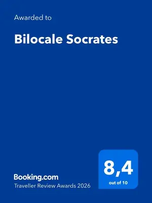 a screenshot of a cell phone with the text awarded to blible scopes at Bilocale Socrates in Rome