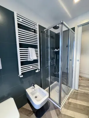 a bathroom with a shower and a sink at F House Trastevere in Rome