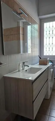 a bathroom with a sink and a mirror at Cento House Casa Vacanze Roma in Rome