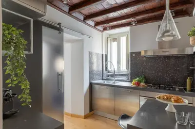 a kitchen with a sink and a counter top at iFlat Trevi's Paradise in Rome