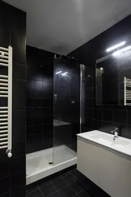 a bathroom with a shower and a sink and a tub at B&B Girovagando in Rome