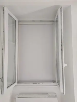 a window in a bathroom with a sink at CasaFaleria in Rome