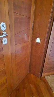a wooden wall with two rolls of toilet paper at Luxury Apartment delle Fratte in Rome