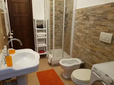 a bathroom with a sink and a toilet and a shower at La Casa di Fabio in Rome