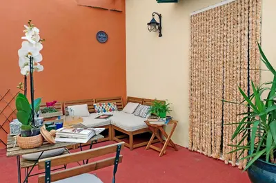 a living room with a couch and a table at Casa Giubbonari con terrazzo in Rome