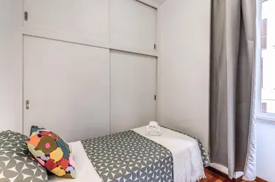 a bedroom with a bed and a window at Oasis Apartment Trastevere in Rome