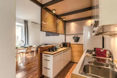 a kitchen with a sink and a counter top at Oasis Apartment Trastevere in Rome