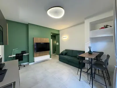 a living room with a couch and a table at Numiro in Rome