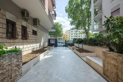 a walkway in the middle of a building at La CASA di EMY in Rome