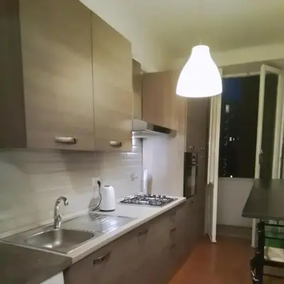 a kitchen with a sink and a stove at Rome Appartment in Rome