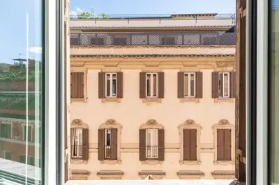 a window view of a building with many windows at Piazza di Spagna 51 Luxury guest house in Rome
