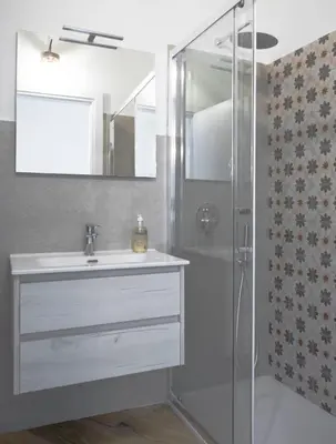 a bathroom with a sink and a shower at Biffi 2 - Garbatella Rooms in Rome
