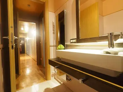 a bathroom with a sink and a mirror at House Borgia in Rome