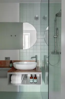 a bathroom with a sink and a glass shower at Ehi Bnb in Rome