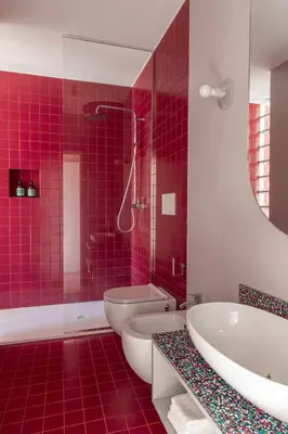 a bathroom with a tub and a toilet and a sink at Ehi Bnb in Rome