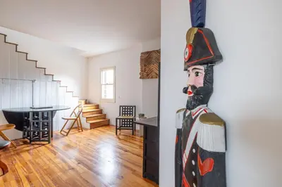 a painting of a soldier on a wall in a room at Pantheon Apartment with Terrace in Rome