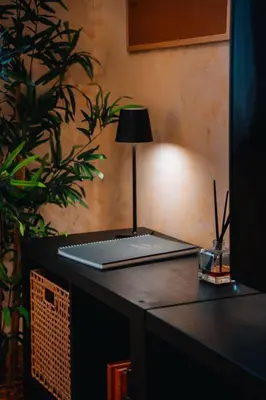 a laptop computer sitting on top of a desk at I ricordi di San Pietro in Rome