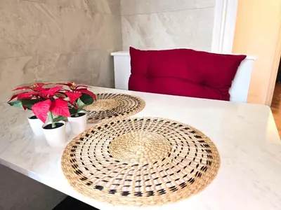two baskets on a table with flowers and plants at Domus Prestige Vaticano 
