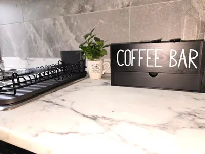 a coffee bar sign sitting on top of a counter at Domus Prestige Vaticano 