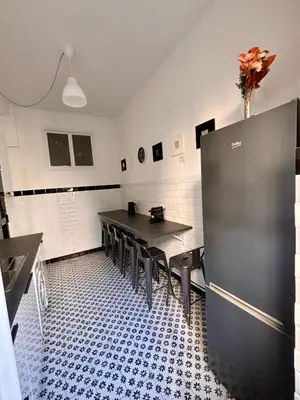 a restaurant with tables and chairs in a room at The Place Strozzi in Rome