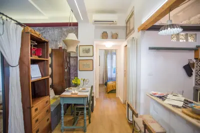 a room with a table and a dining room at Apartment in the center of Rome in Rome