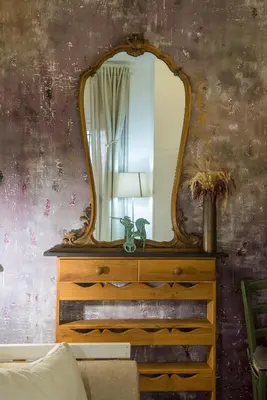 a dining room with a table and a vase of flowers at Apartment in the center of Rome in Rome