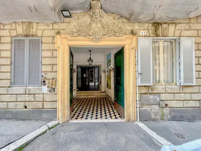 an open doorway to a building with a door at Splendido attico a Roma in Rome