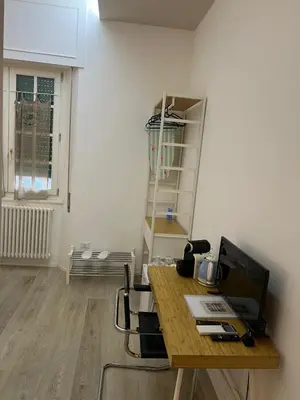 an office with a desk with a computer on it at Malila's-Cipitelli San Pietro in Rome