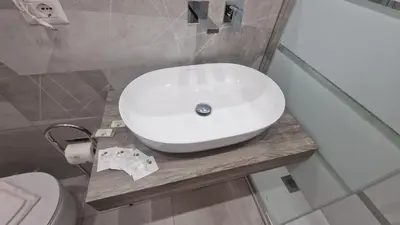 a bathroom with a white sink and a toilet at Relux Pretoria Rooms in Rome
