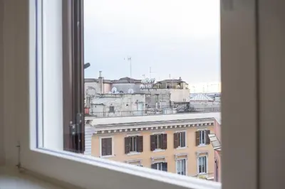 a view of a city from a window at Bhr Brancaccio 83 in Rome