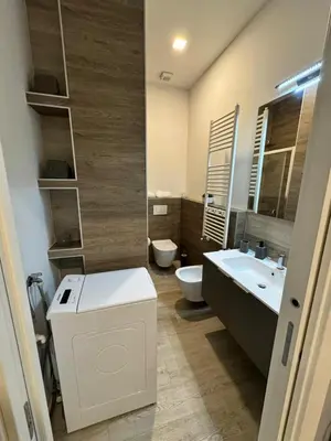 a bathroom with a sink and a toilet and a sink at Malila's - Cipitelli Spagna in Rome