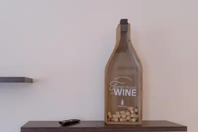 a bottle of wine sitting on a table at Domus Gianicolensis in Rome