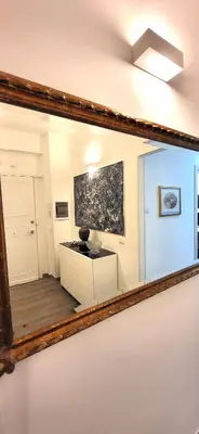 a mirror on a wall in a room at Trastevere Welcome Home Deluxe 2 in Rome