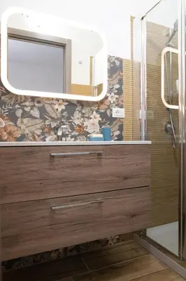 a bathroom with a sink and a mirror at Gmm in Rome