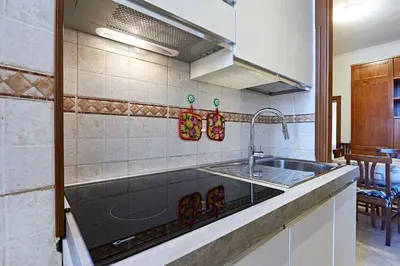 a kitchen with a sink and a counter at Close to the Spanish Steps, WIFI, Air Cond, 2 bedrooms in Rome